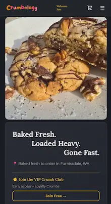 Crumbology website shown on desktop and mobile devices, featuring dark mode bento grid layout with cookie products - mobile view